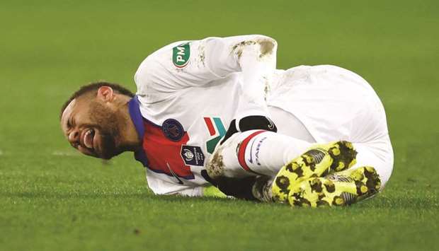 Paris St Germainu2019s Neymar reacts after sustaining an injury during the French Cup Round of 64 match against Caen. (Reuters)