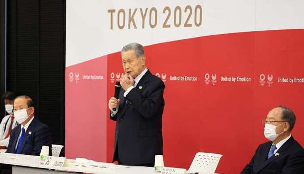 Tokyo 2020 Olympics organizing committee president Yoshiro Mori announces his resignation as he takes responsibility for his comments at a meeting with council and executive board members at the committee headquarters, in Tokyo