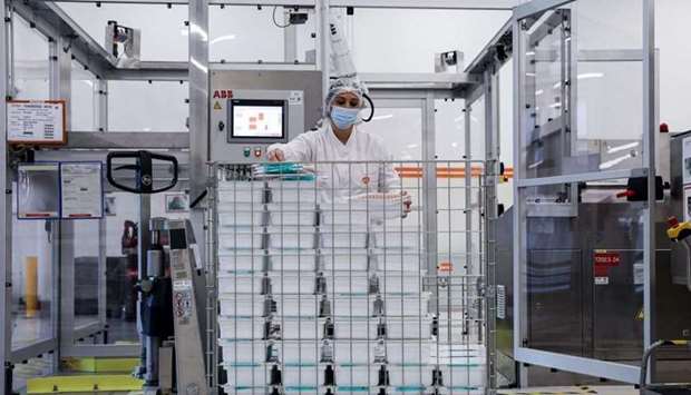 An employee is at work at the factory of British pharmaceutical company GlaxoSmithKline (GSK) in Wavre on February 8, where the Covid-19 CureVac vaccine will be produced. AFP