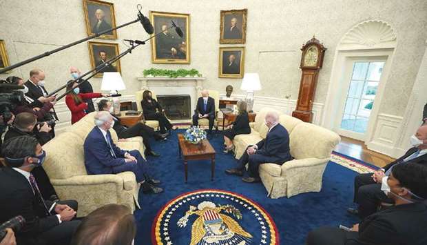 US President Joe Biden and Vice President Kamala Harris meet with governors and mayors on his Covid-19 relief plan, in the Oval Office of the White House in Washington, DC yesterday.