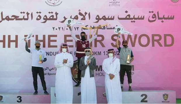 HE the Minister of Culture and Sports Salah bin Ghanem Al Ali crowns the winners of the endurance race on the Sword of His Highness the Amir Sheikh Tamim bin Hamad Al-Thani at the Marathon village in Sealine