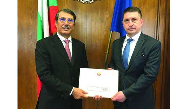 Qatar's ambassador to Bulgaria Rashid bin Ali al-Khater hands over the message to  Bulgarian Minister of Interior Hristo Terziyski