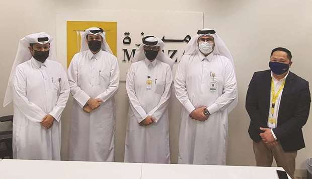 (From right) Cwallet CEO and founder Michael Javier, Meeza CTO Faisal al-Kuwari, Cwallet COO Abdulmohsin al-Yafei, Meeza CEO engineer Ahmad al-Muslemani, and Meeza COO Mohsin al-Marri.