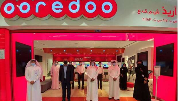 Senior Ooredoo representatives during the reopening ceremony.