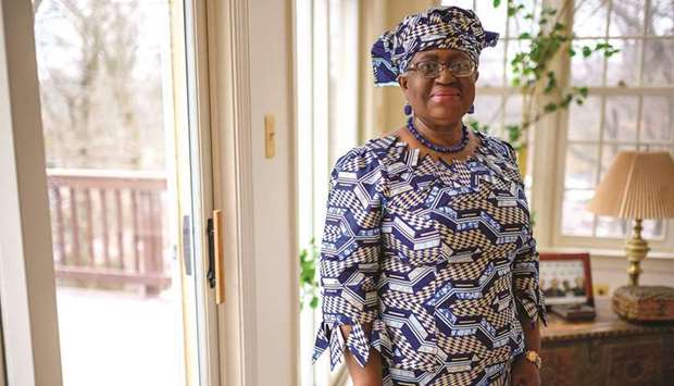 Nigeriau2019s Ngozi Okonjo-Iweala poses at her home in Potomac, Maryland, near Washington DC, as she was confirmed as the first woman and first African leader of the beleaguered World Trade Organisation yesterday.