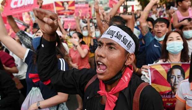People participate in a protest against the military coup in Yangon, Myanmar