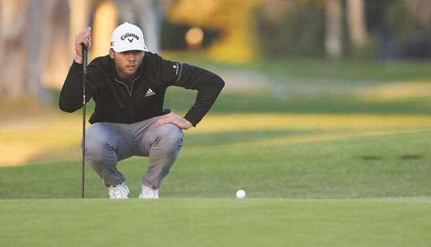 Sam Burns of the United States lines up a putt on the 12th green during the third round of The Genesis Invitational at Riviera Country Club in Pacific Palisades, California, United States, yesterday. (AFP)