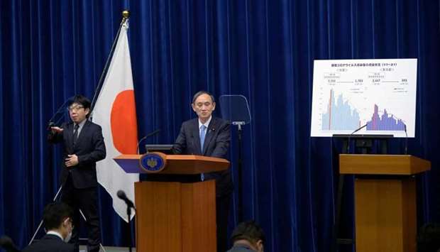 Japan's Prime Minister Yoshihide Suga speaks during a news conference on the coronavirus disease situation at the prime minister's official residence in Tokyo, Japan