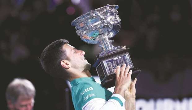 Serbiau2019s Novak Djokovic celebrates after beating Russiau2019s Daniil Medvedev in their Australian Open final yesterday.