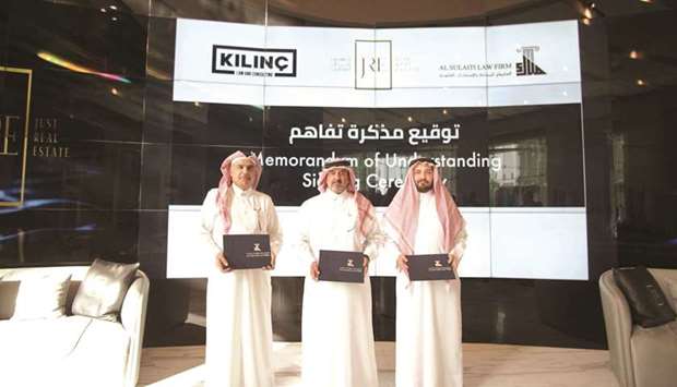 Just Real Estate, Al Sulaiti Law Firm and Kilinc Law & Consulting officials after the signing ceremony.