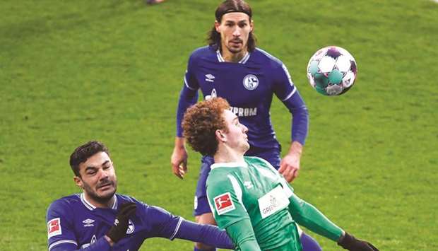 Schalke 04u2019s Ozan Kabak (right) and Werder Bremenu2019s Josh Sargent (left) in action during their Bundesliga match in Bremen, Germany, on January 30, 2021. (Reuters)