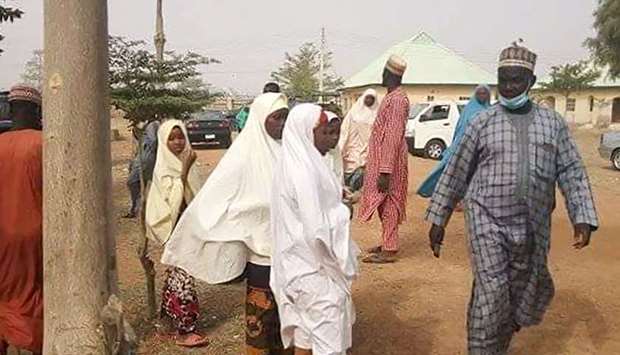 Parents arrive at the school compound, of children kidnapped by bandits, in Jangede, Zamfara State i