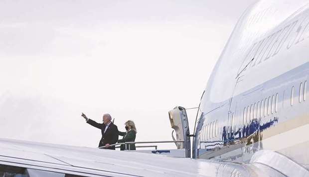 US President Joe Biden and first lady Jill Biden board Air Force One as they depart Texas to return to the White House, at Ellington Field Joint Reserve Base in Houston, Texas on February 26. Biden wants to overhaul the nationu2019s grids so they derive all electricity from carbon-free sources by 2035 u2013 a major step towards zeroing out net emissions of greenhouse gases by mid-century. Realising that goal will require building billions of dollars worth of new transmission lines, a challenge that might prove just as difficult as getting his climate agenda through Congress.