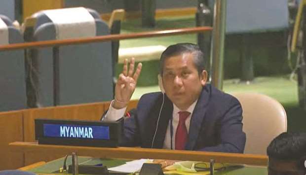 Myanmaru2019s ambassador to the UN Kyaw Moe Tun making a three-finger salute as he addresses an informal meeting of the United Nations General Assembly on Friday in New York.