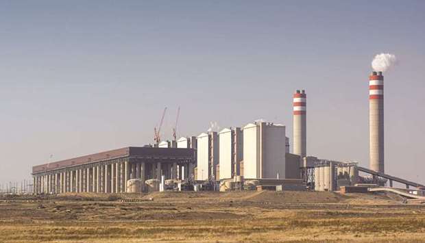 Emissions rise from the Eskom Holdings Kusile coal-fired power station near Witbank in Mpumalanga, South Africa. Bondholders of the state-owned electricity company are watching the latest round of rescue talks from a distance. Yields suggest theyu2019re confident their money is safe, whether or not the discussions result in a sustainable solution for Eskomu2019s  $32bn debt pile.