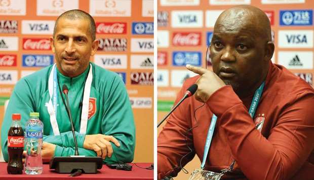 Al Duhailu2019s French coach Sabri Lamouchi (L) and his Al Ahly counterpart Pitso Mosimane of South Africa address the media yesterday ahead of their FIFA Club World Cup clash.