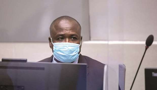 Lordu2019s Resistance Army (LRA) ex-commander Dominic Ongwen sits in the courtroom of the  International Criminal Court (ICC) in The Hague.
