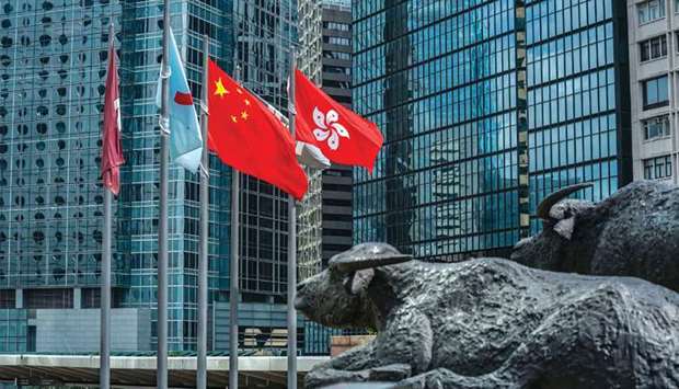 Sculptures seen outside the Hong Kong Stock Exchange. Hong Kong IPOs are technically off limits to investors from mainland China, where annual foreign-exchange purchases by individuals are capped at $50,000 and residents must pledge they wonu2019t put the money in offshore securities.