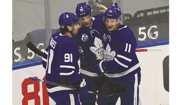 Toronto Maple Leafs forward Jason Spezza (centre) celebrates his goal against the Vancouver Canucks with teammates John Tavares (left) and Zach Hyman at Scotiabank Arena in Toronto. (USA TODAY Sports)