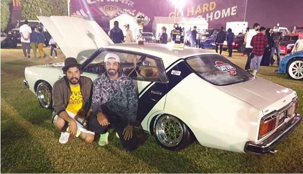 Ismail Waheed (left), and Abdullah al-Hajri with their prize-winning car.