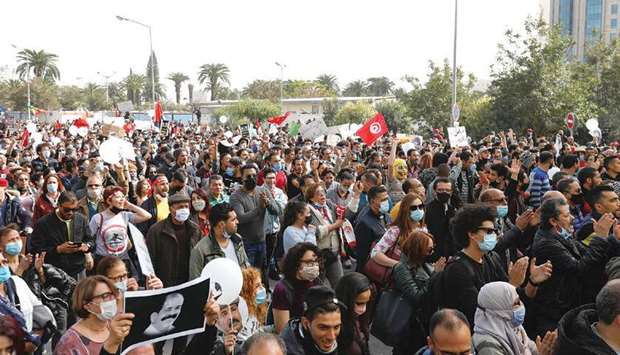 Demonstrators protest to mark the anniversary of a prominent activistu2019s death and against allegations of police abuse, in Tunis, yesterday.