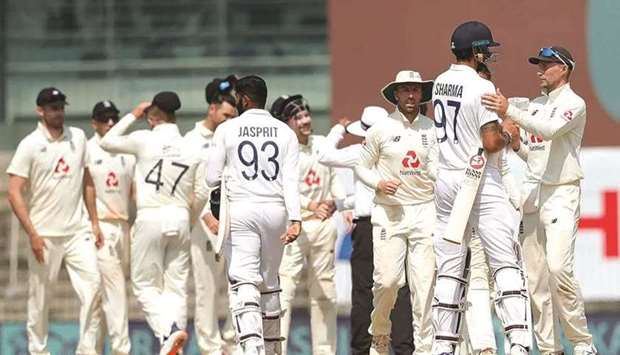 England captain Joe Root (right) shakes hand with Indiau2019s Iashant Sharma after winning the first Test in Chennai yesterday. (BCCI)