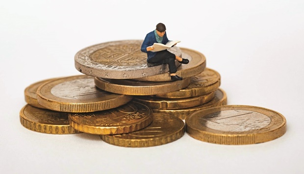 businessman sat on coins, businessman miniature and coins