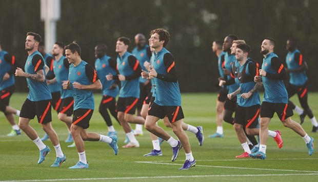 Chelseau2019s Marcos Alonso (centre) trains with teammates in Abu Dhabi yesterday, on the eve of Club World Cup final against Palmeiras. (Reuters)