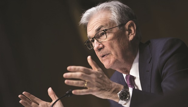 Powell: Preparing to raise interest rates in March, the first of at least three hikes in 2022.