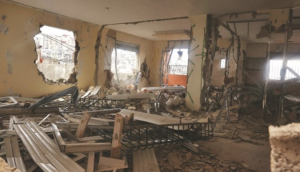 A picture taken yesterday shows the damaged interior of the family home of Palestinian Hamas member Fadi Abu Shkhaydam u2014 killed by Israeli police last year u2014 after its demolition by security forces in the Shuafat refugee camp in Jerusalem.