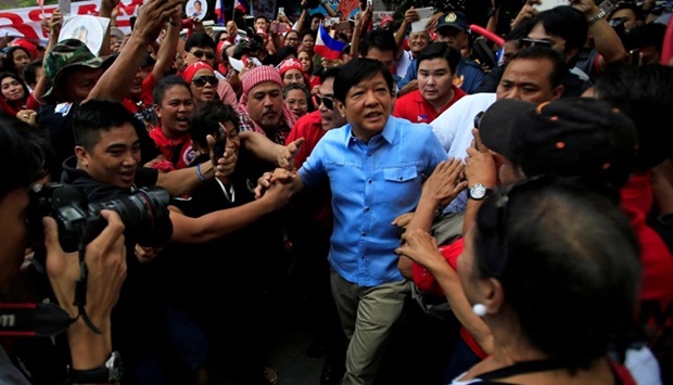 Former senator Ferdinand ,Bongbong, Marcos Jr and son of late former dictator Ferdinand Marcos is greeted by his supporters upon his arrival at the Supreme Court in metro Manila, Philippines April 17, 2017. REUTERS