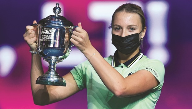 Estoniau2019s Anett Kontaveit celebrates with the trophy after beating Greeceu2019s Maria Sakkari in the finals of the Saint-Petersburg Ladies Trophy in Saint-Petersburg on Sunday. (AFP)