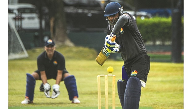 This photo taken on February 2, 2022, shows Vimal Kumar of the Philippines national cricket team batting during a team training session at the United Club pitch in Paranque City in suburban Manila. (AFP)
