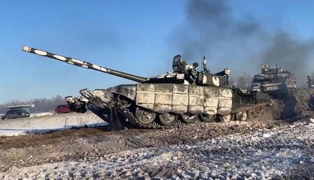 This handout video grab released by the Russian Defence Ministry, shows Russian tanks leaving for Russia after joint exercises of the armed forces of Russia and Belarus as part of an inspection of the Union State's Response Force, at a firing range near Brest. AFP/Russian Defence Ninistry