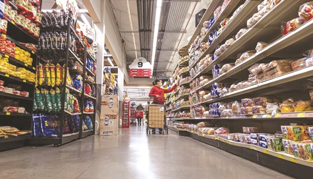 A customer shops for groceries at a store in San Francisco. US consumers donu2019t expect red-hot inflation levels to last in the long term. Thatu2019s the takeaway from data analysis by six co-authors including New York Fed President John Williams, who was listed as a co-writer in the regional Fedu2019s Liberty Street Economics blog series for the first time.