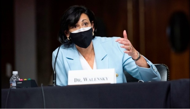 The US Centers for Disease Control and Prevention is weighing new Covid-19 guidance, including on when to wear face masks, CDC Director Rochelle Walensky said at the same briefing, adding that hospital capacity will be a key metric.