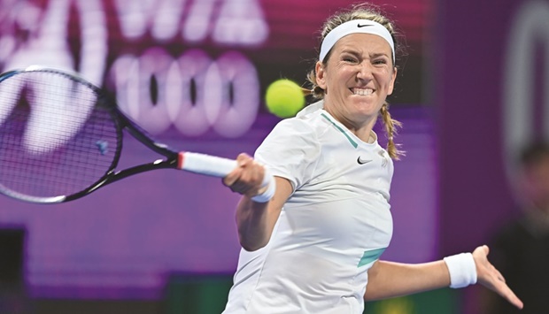 Victoria Azarenka of Belarus unleashes a forehand against Yulia Putintseva of Kazakhstan on Day One of the Qatar TotalEnergies Open at the Khalifa Tennis and Squash Complex yesterday. Azarenka won the match 5-7, 6-2, 7-5 to advance to the second round. Picture: Noushad Thekkeykil