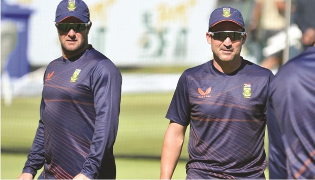 South Africa coach Mark Boucher (left) with captain Dean Elgar