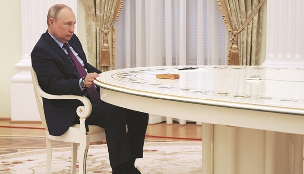 Russian President Vladimir Putin contemplates during a meeting with his Azerbaijani counterpart at the Kremlin in Moscow yesterday. (AFP)