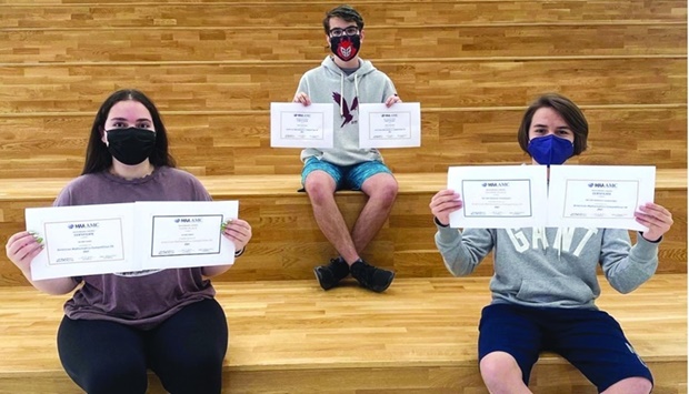 The students who clinched the top three places.