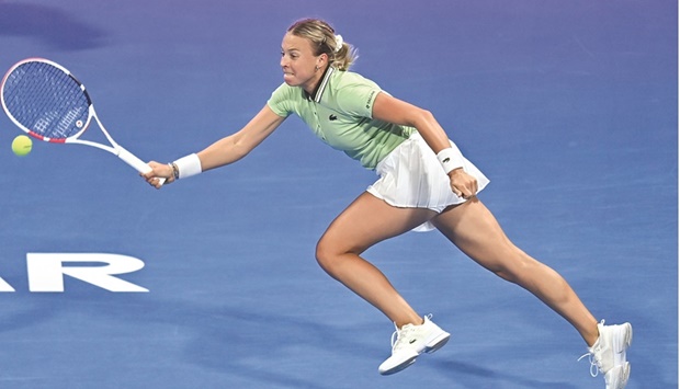 Iga Swiatek of Poland in action agaisnt top seed Aryna Sabalenka of Belarus during their quarter-final at the Qatar TotalEnergies Open in Doha onThursday..