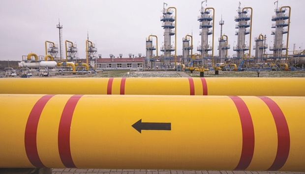 Pipework showing flow direction at the Kasimovskoye underground gas storage facility, operated by Gazprom, in Russia. European natural gas prices halted a record-breaking rally as Russian flows to the continent ramped up and US sanctions targeting Moscow omitted the energy sector.