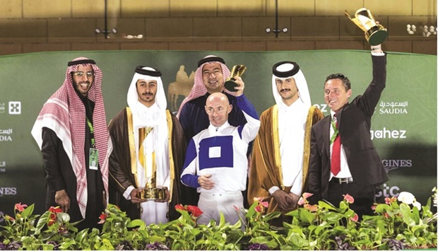 Obaiya Arabian Classic Cup winner Hadi De Carrerreu2019s connections celebrate with the trophy on Saturday. PHOTO BY: Jane Barell