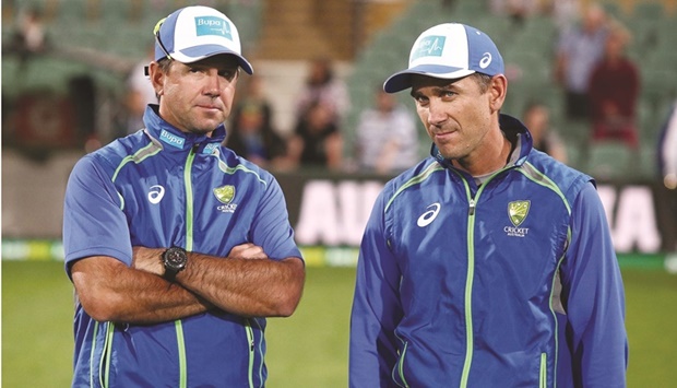 Former Australian captain Ricky Ponting is seen with current coach Justin Langer (right) during a training session in this 2018 file photo. Ponting has backed his former teammate Langer in getting an extension as the Australian coach but current Test skipper Pat Cummins has failed to publicly endorse the coach winning another deal from Cricket Australia.