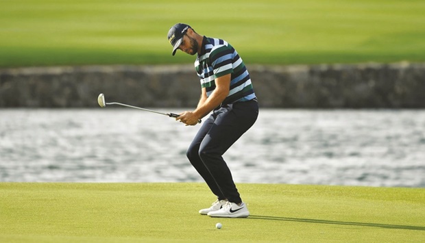 Spainu2019s Adri Arnaus reacts after playing a shot during the second round of the Saudi International golf tournament at the King Abdullah Economic City in Saudi Arabia yesterday.