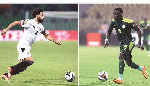 This combination of file pictures shows Egyptu2019s forward Mohamed Salah (left) in Garoua on January 15, 2022 and Senegalu2019s forward Sadio Mane in Yaounde on February 2, 2022. (AFP)