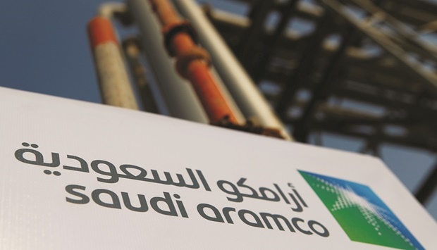 The Saudi Aramco logo is pictured at the oil facility in Abqaiq, Saudi Arabia. While rallying crude prices have buoyed the companyu2019s financial performance, it hasnu2019t resulted in higher dividends which may dampen interest among international investors.