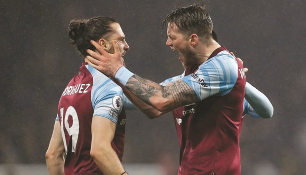 Burnleyu2019s Jay Rodriguez (left) celebrates scoring against Manchester United with Wout Weghorst during their Premier League match in Turf Moor in Burnley on Tuesday. (Reuters)