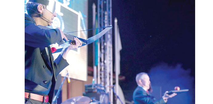 CLASSIC: Alfonso performing his famous blindfolded crossbow act. 