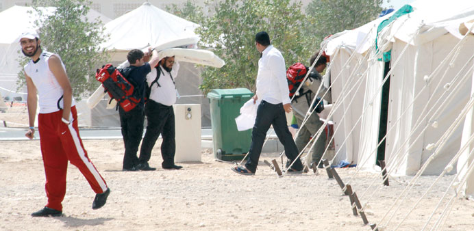 Volunteers preparing to live in the tents.